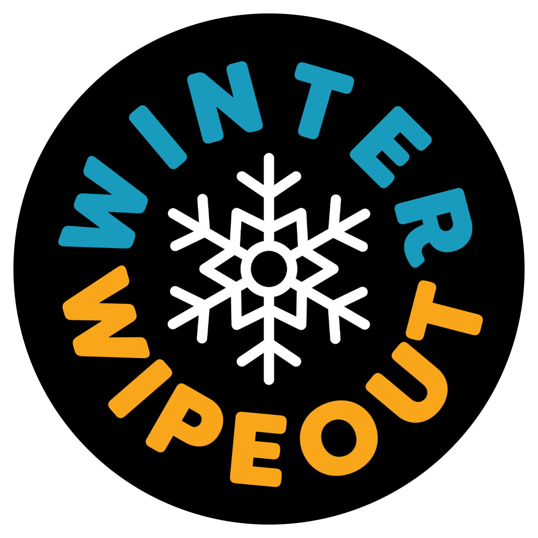 Winter Wipeout logo words on a black circle with a white snow flake in the middle. 