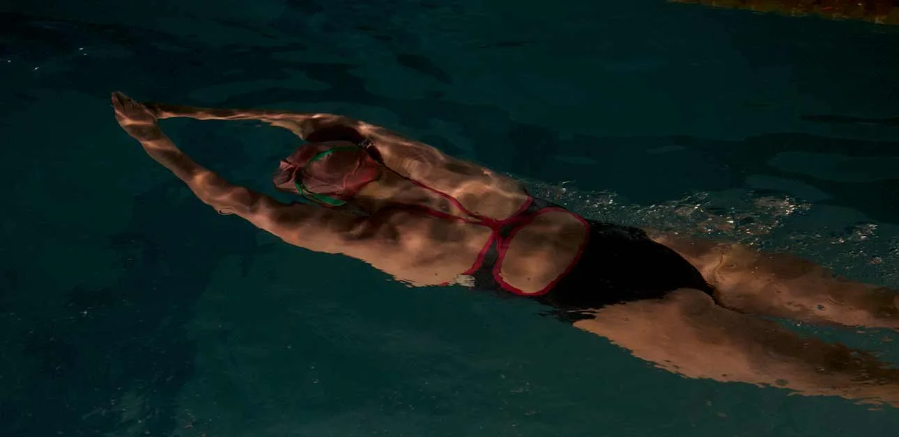 Person swimming under the water