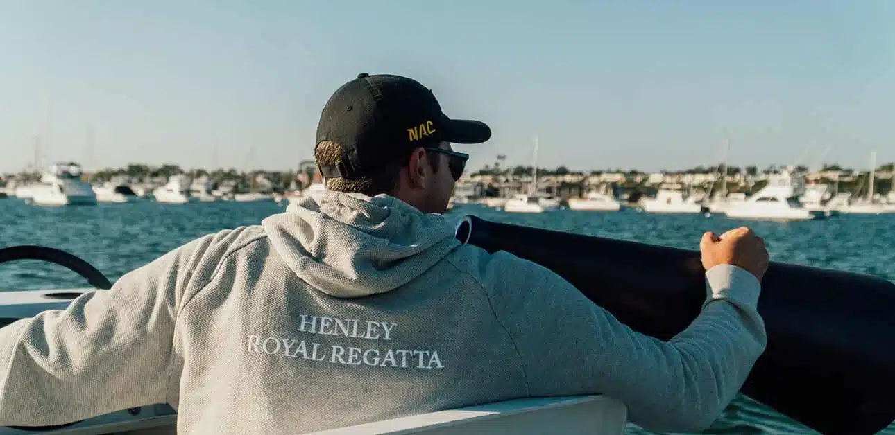 Coaching-Coxswains–A-guide-for-rowing-coaches A coach on a rowing launch coaching with a megaphone